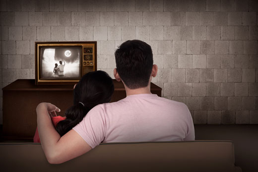 Couple watching retro tv