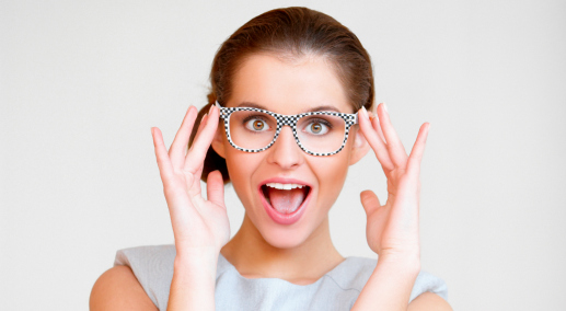 Portrait of a young attractive business woman with glasses